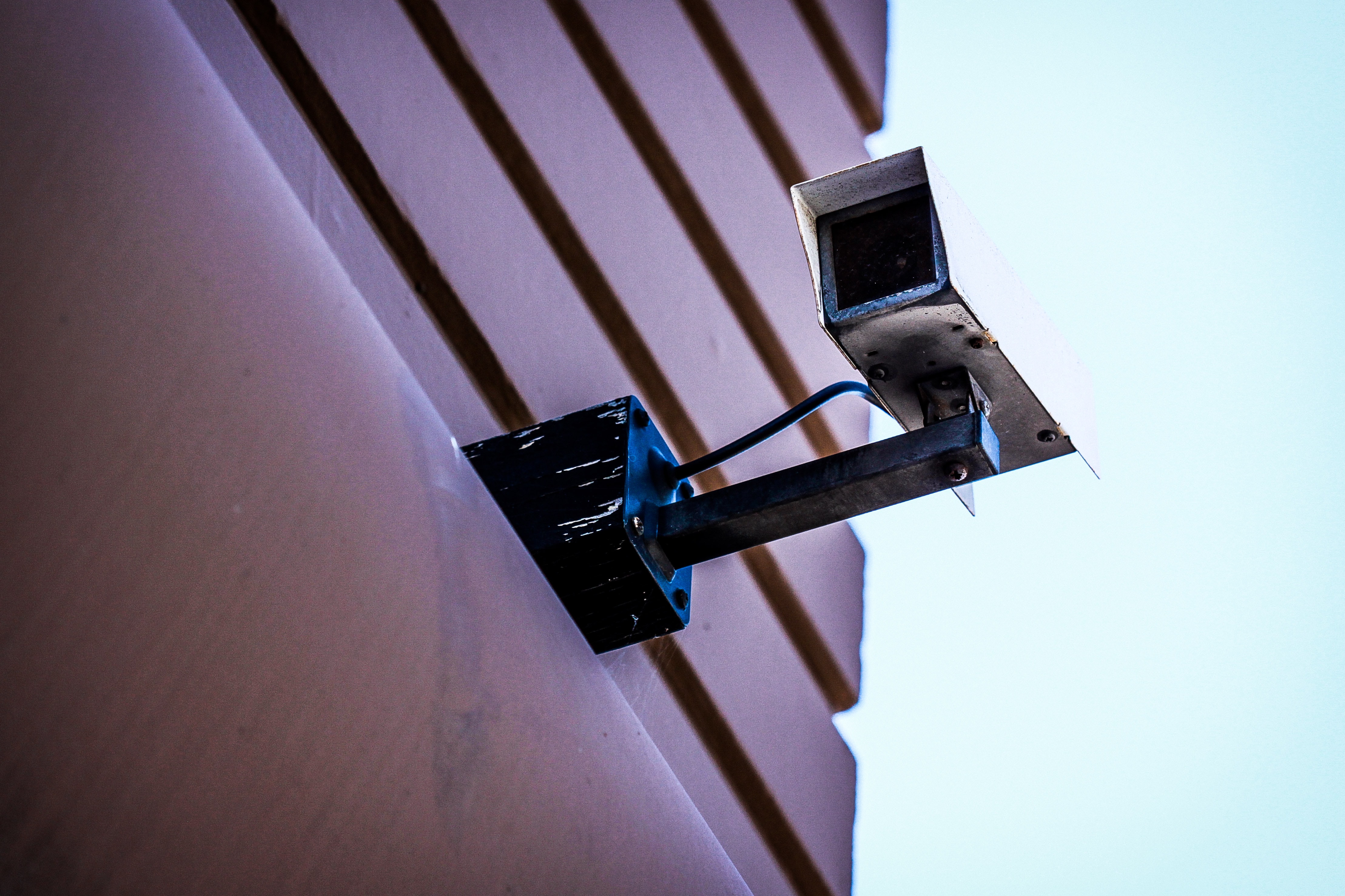 A CCTV camera mounted on a wall 